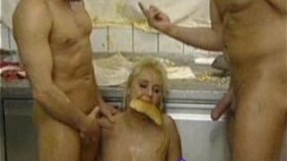 Food covered threesome in a kitchen - porn video